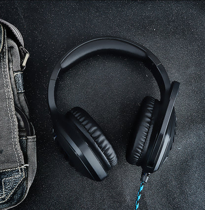 Black-blue wired gaming headset with padded earcups and microphone